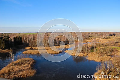 National park with karst lakes and flooded old grass meadow in Kirkilai, Lithuania. Walk at the wetland reserve. Stock Photo