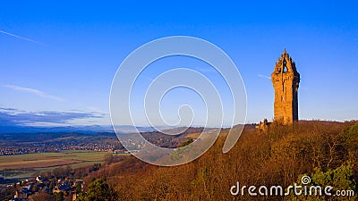 The National Wallace Monument is a tower standing on the shoulder of the Abbey Craig, a hilltop overlooking Stirling in Scotland Stock Photo