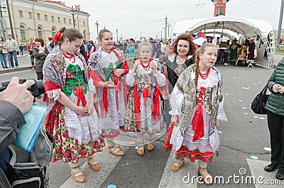 The Nationalities Ball participants: Polish folk dance ensemble `Gaik` after the performance. Editorial Stock Photo