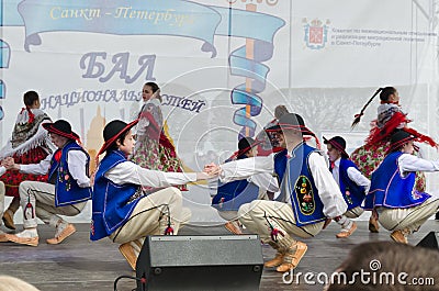 The Nationalities Ball participants: on the stage Polish folk dance ensemble `Gaik`. Editorial Stock Photo