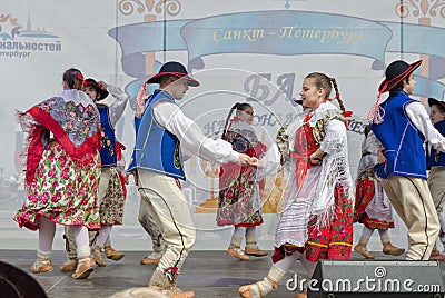 The Nationalities Ball participants: on the stage Polish folk dance ensemble `Gaik`. Editorial Stock Photo