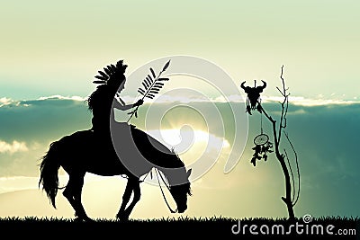 Native America Indian on horseback at sunset Stock Photo