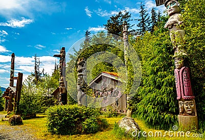 Native American Clan House and Totems Editorial Stock Photo