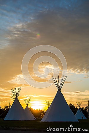 Native American Tepees on the Prairies at Sunset Stock Photo