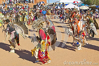Native Americans in full regalia dancing Editorial Stock Photo