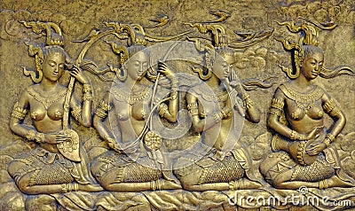 Native culture Thai sculpture on the temple wall Stock Photo