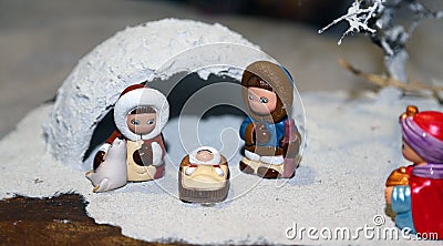 Nativity scene with Holy Family and an Eskimo igloo Stock Photo