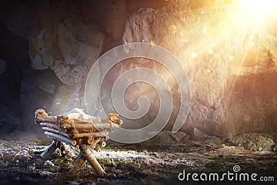 Nativity - Waiting Birth Of Jesus Christ With Manger In Cave With Holy Light Stock Photo