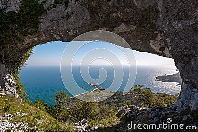 Natural arch called Ojo del Diablo in Cantabria, Spain Stock Photo