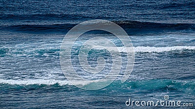 Natural background with blue tints of oceanic waves Stock Photo