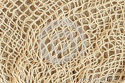 Natural background of mesh string reusable knitted bag. Concept of zero waste, recycling, ecology Stock Photo