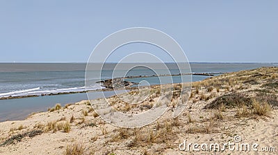 Natural beach sand dunes with sea water on Soulac-sur-Mer in france Stock Photo