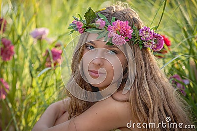 Natural beauty and health, woman with flowers in hair. Stock Photo