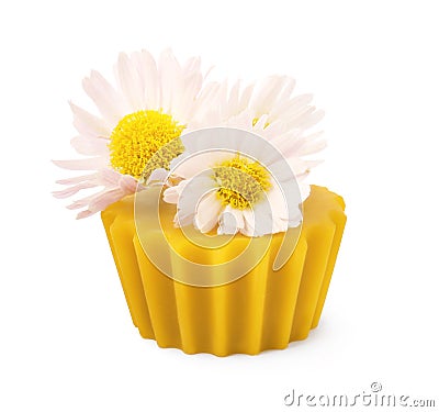 Natural beeswax cake block and flower isolated on white Stock Photo