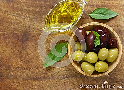 Natural black and green olives with herbs Stock Photo