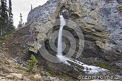Natural Bridge Arch and Scenic Waterfall Rock Feature Stock Photo