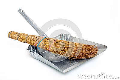 Natural broom in metal dustpan Stock Photo