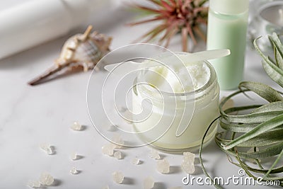 Natural cold-pressed Shea butter for skin care of the face and body, nails and hair, massage and preparation of homemade creams Stock Photo