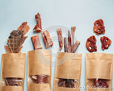 Natural dried treats for dogs. Treats for rewarding and training dogs. Dried meat products for dogs. Animal care Stock Photo