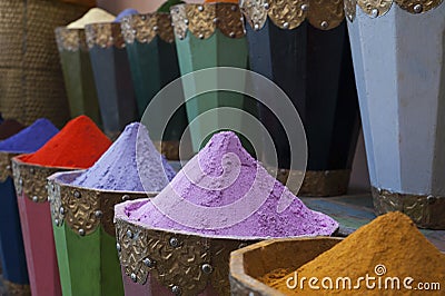 Natural dyes, colorful and vibrant pigment powders in wooden pots Stock Photo