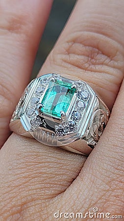 Natural Colombian emerald silver ring for men. The hand carved ring with vintage and Malay traditional design. Great craftsmanship Stock Photo