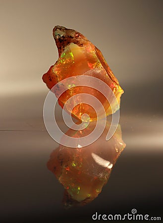 Natural fire play-of-colour opal Welo Stock Photo