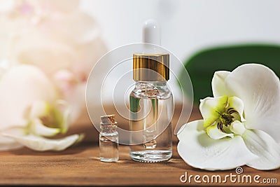 Natural flower essential oil bottles with orchid blossom Stock Photo