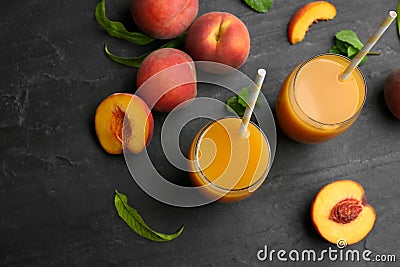 Natural freshly made peach juice on grey table, flat lay Stock Photo