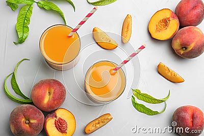 Natural freshly made peach juice on light table, flat lay Stock Photo