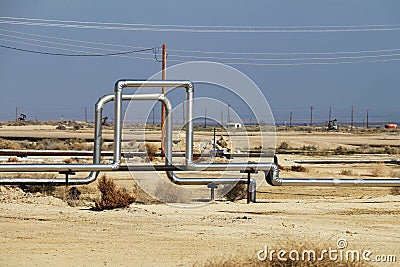 Natural gas pipeline rural power plant pipes energy lines desert mine natural gas underground pipes supply Stock Photo