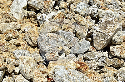Natural gray gypsum stone. Close up image of stones with black and white. Industrial mining area. Limestone mining, quarry Stock Photo