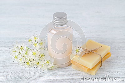 Natural hair shampoo, handmade soap bar with fresh flowers Stock Photo