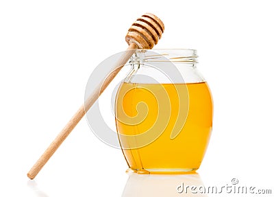 Natural honey in a glass jar Stock Photo