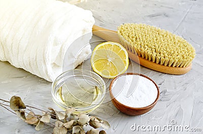 Natural Ingredients for Homemade Body Sea Salt Scrub Lemon Olive Oil White Towel Stock Photo