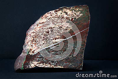 Natural Jasper stone with a single polished surface. Stock Photo