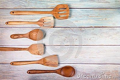 Natural kitchen tools wood products / Kitchen utensils background with spoon ladle spatula various sizes object utensil wooden Stock Photo
