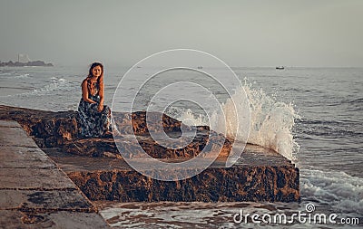 Natural landscape portrait of model with waves. Stock Photo