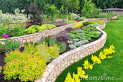Natural landscaping in home garden Stock Photo