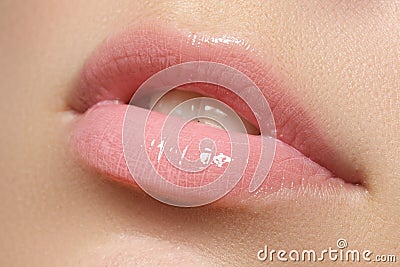 Natural lips. Close up shoot of young beautiful girl with perfect skin. Lips Stock Photo