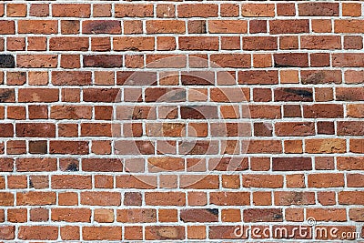Natural old vintage weathered red brown solid brick wall. Abstract copy space background. Stock Photo