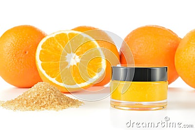 Natural orange sugar lip scrub on white. Stock Photo