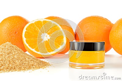 Natural orange sugar lip scrub on white. Stock Photo