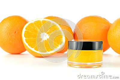 Natural orange sugar lip scrub on white. Stock Photo