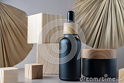Natural organic SPA cosmetics products branding mockup. Dropper bottle and cream jar. containers on brown background. Trendy Stock Photo