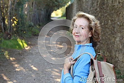 Natural outdoorsy 65 years old woman Stock Photo