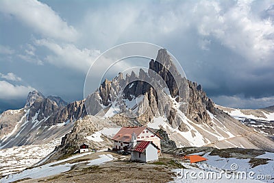 Natural park Tre CimÐµ in Dolomites, Italy. Mount Paterno and Refuge Locatelli Stock Photo