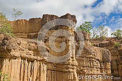 Natural phenomenon of eroded cliff, soil pillars, rock sculpture Stock Photo