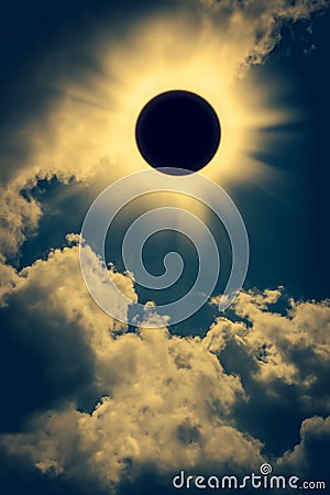 Natural phenomenon. Solar eclipse space with cloud on gold sky b Stock Photo