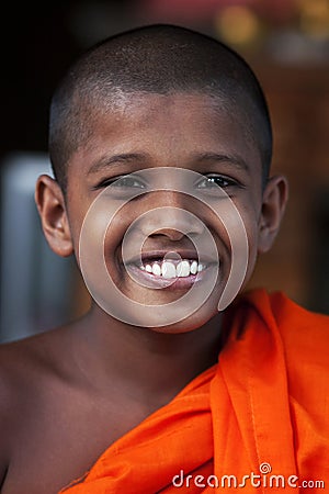 Natural portrait of a smiling child monk Editorial Stock Photo