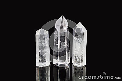 Natural quartz stone on black background Stock Photo